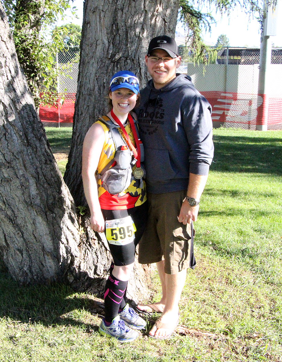 Kaitlyn and her boyfriend Michael after she crossed the finish line of her first half-marathon. 